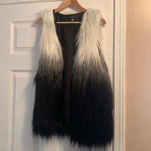 Black & white fur vest. Size Medium.
